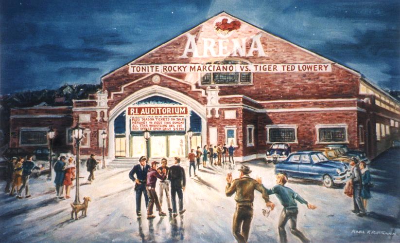 A large gable-roof-style red brick building that housed a stadium inside with large floor available for hockey or basketball games as well as a stage for performances